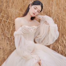 2021 new sexy one-shoulder wedding dress forest photography travel champagne color heavy industry wedding dress high-end customization