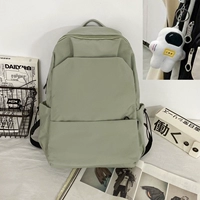 Зеленый большой плюшевый космонавт