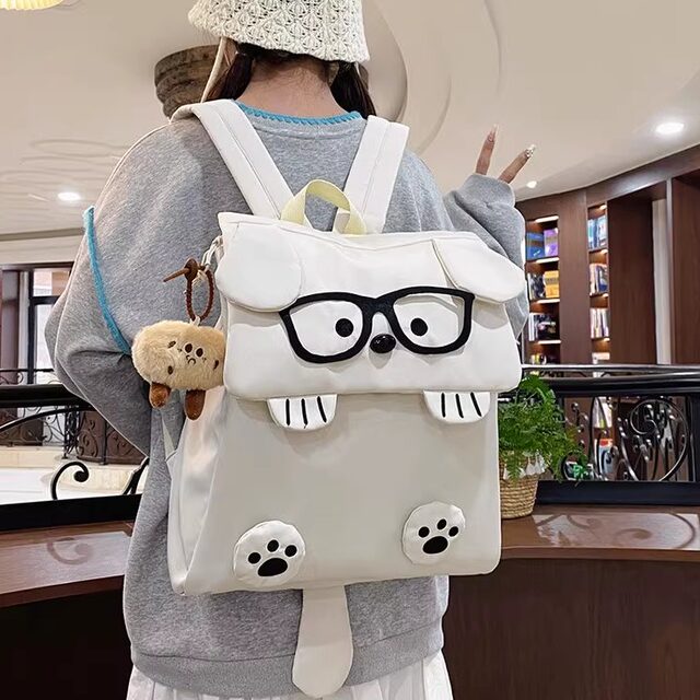Cute ugly puppy schoolbag Japanese ins female junior high school student niche backpack female college student high school student backpack