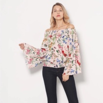 Lady Giles with a line of printed snow-spinning shirts and a slight flawless no-no-no dont take a selfie.