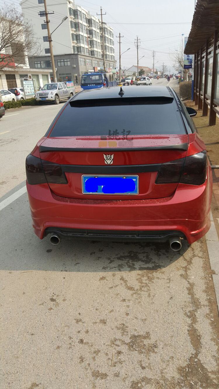 Dongwangyang Cruze sửa đổi đuôi Sanjing đấm gió miễn phí 09-14 đặc biệt Chevrolet Duckbill độ đuôi gió xe ô tô