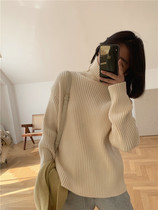 Zhou Wood Wood apit high collar thick thick needle sleeve loose leisure lazy sweater Foundation wild solid color Winter