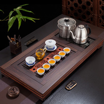 Ebony tea tray Golden stove E9 solid wood tea table simple carved household tea sea large thickened drainage Kung Fu tea set