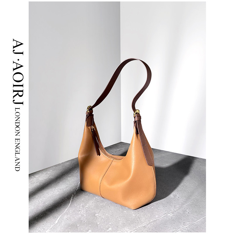 (British AJ AOIRJ) niche brand fashion commuter large-capacity leather women's bag shoulder diagonal baguette bag