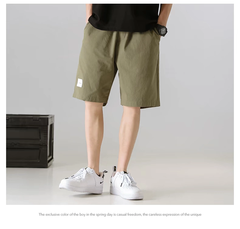Mùa hè quần short nam mới xu hướng Nhật Bản thả lỏng chân thẳng màu rắn quần năm điểm giản dị tất cả quần yếm mỏng - Quần làm việc