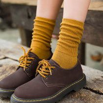 Solid color socks womens autumn and winter mid-tube socks ins Chaodui heap socks womens Korean stockings womens street Japanese black long tube