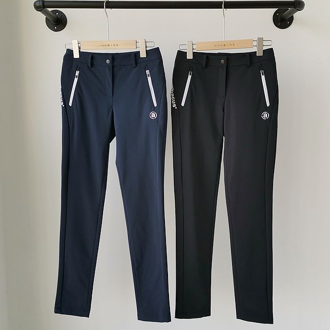 a Women's golf trousers with zipper pockets, elastic side spelling, slim and comfortable golf trousers in two colors