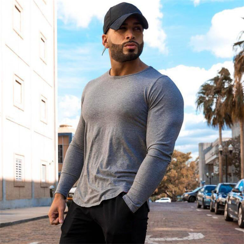 Cơ bắp anh em thể thao áo thun dài tay nam thời trang Slim thun hồ quang hem rắn màu áo sơ mi giản dị áo tanktop nữ