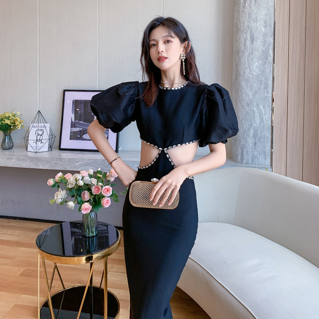 Design sense high waist rhinestone backless black dress Europe and the United States ins minority open waist hollow puff sleeve dress