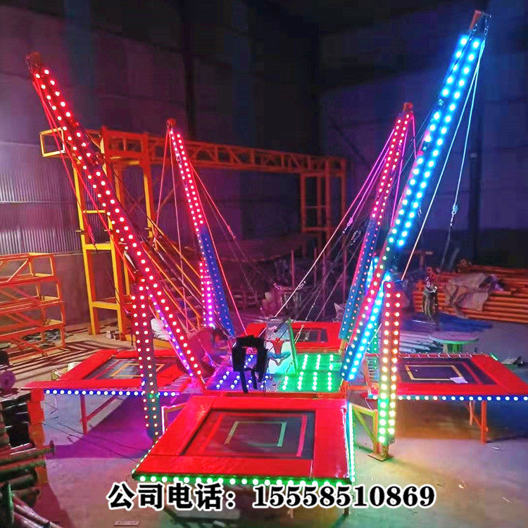Square Park rental stalls colorful lights lighting bungee jump four people electric luxury bounce bed outdoor inflatable bungee bed