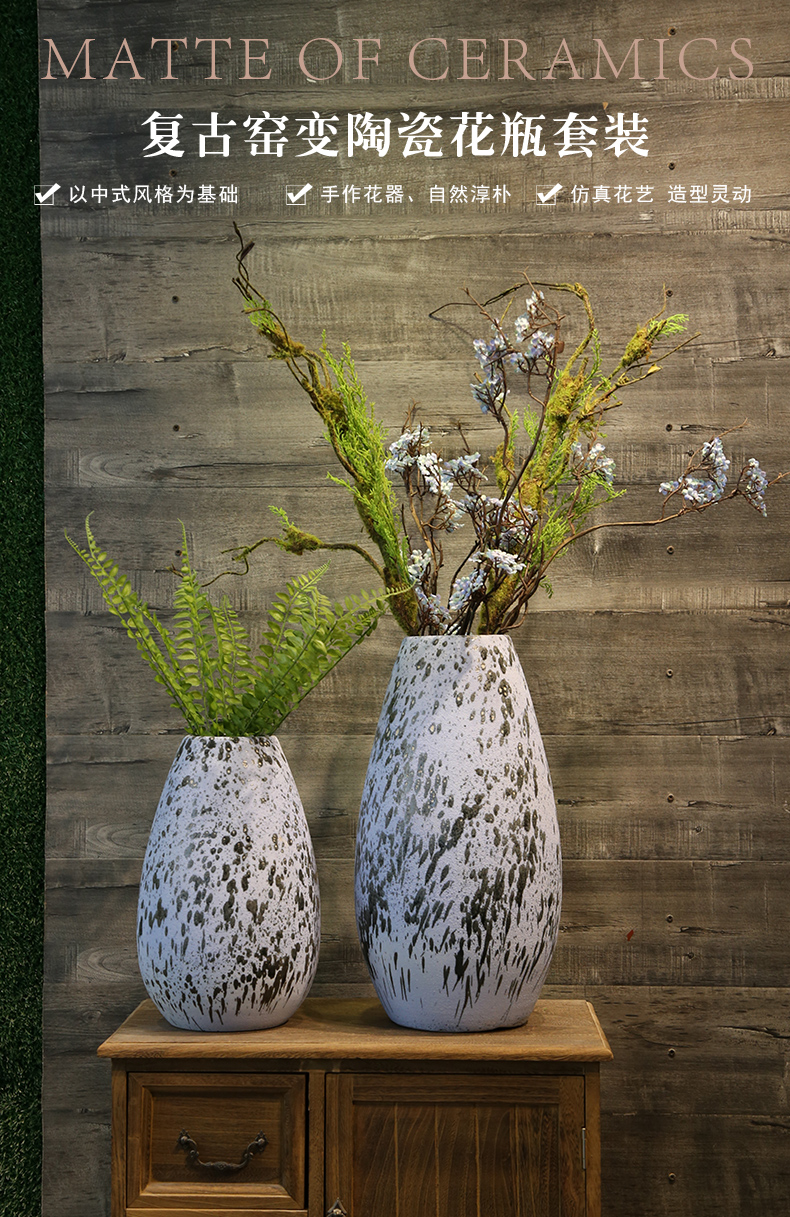 Jingdezhen coarse pottery dated mesa vase teahouse adornment is placed between example simulation flowers floral arrangements