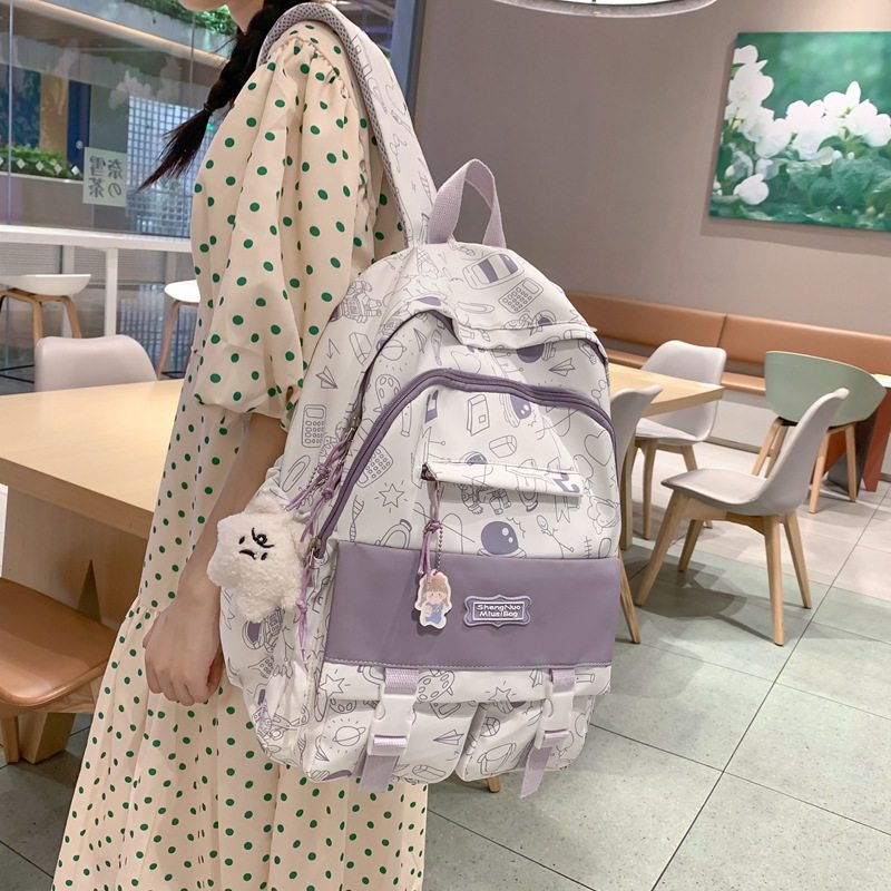 Niche graffiti original design backpack female Japanese ins all-match high school students junior high school backpack to reduce schoolbag