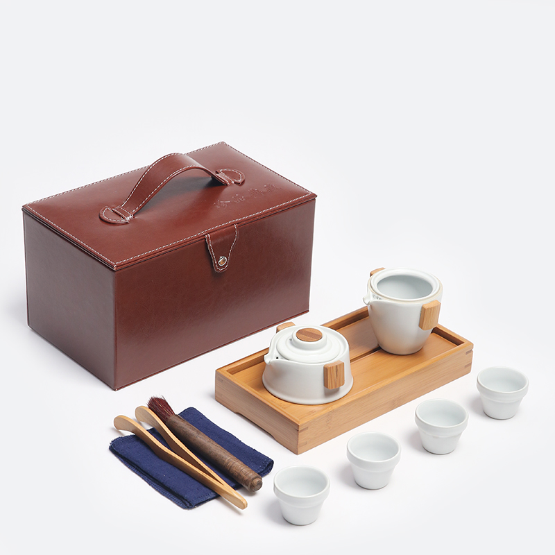 The Product porcelain sink "street" on the pot of business travel ceramic tea set four cups crack cup to carry a pot of tea tray