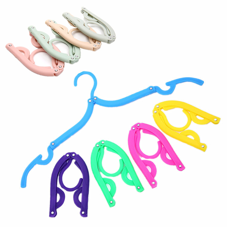 Travel clothes hangers travel on business trips Folds Clothes Hanger Clips Portable Hanger Magic Clothes Hanger Clotheshorse God 019