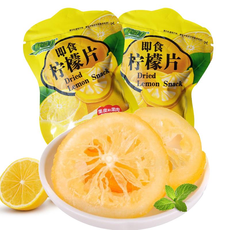 The whole suite of fresh gravitational lemon pieces of gold orange lemon fruit and casual food office snacks