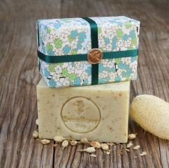 Floral jasmine with a floral soap in the hand.