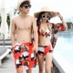 Cặp đôi đồ bơi nữ bikini ba mảnh ngực nhỏ tụ tập nước hoa nhỏ gợi cảm quần lọt khe nam quần bơi nóng bỏng