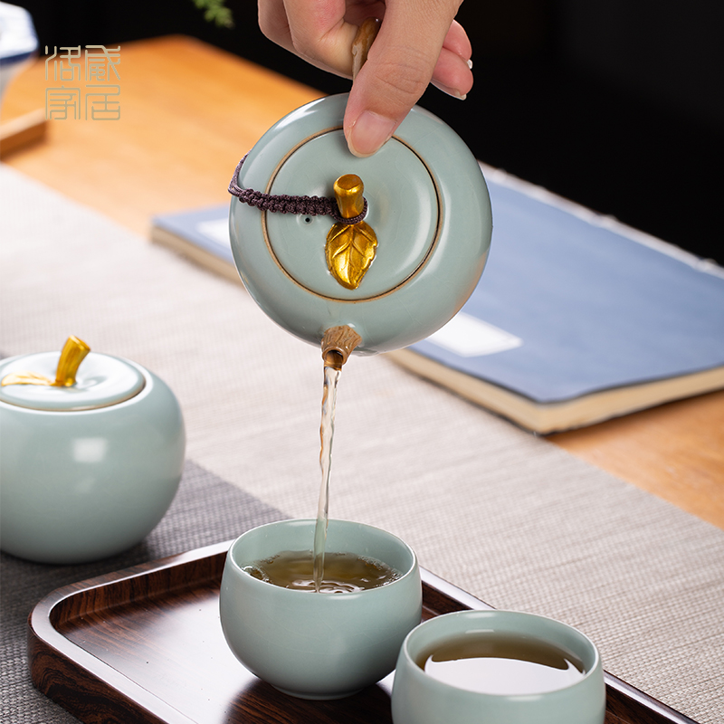 Travel tea set suit small sets of portable is suing accompanying your up jingdezhen ceramics a pot of four cups of kung fu tea set
