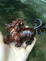 Hainan Huanghua pear purple oil pear old material unicorn carved parts pure handlework