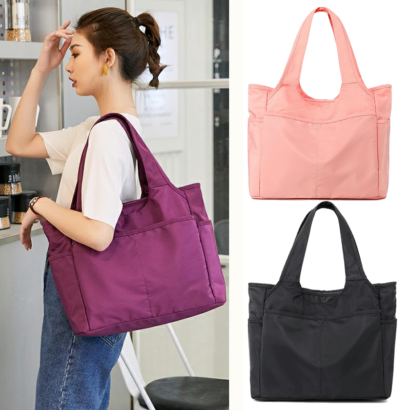 Travel bag female new tide light, water and short distance handbag large capacity nylon single shoulder pack tourism fitness pack