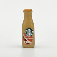 Светлая кофейная бутылка с оранжевой крышкой