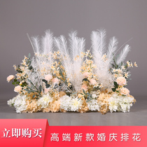 Wedding road leads to flower row Wedding road leads to long rows of wedding flower balls Stage decoration rows of flower props simulation floral art