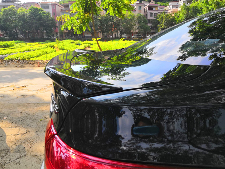 Đuôi Xuanyi mới sửa đổi 12-18 Dongfeng Nissan sửa đổi ngoại hình 14 16 17 thần kinh không cổ điển cánh lướt gió