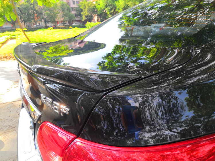 Đuôi Xuanyi mới sửa đổi 12-18 Dongfeng Nissan sửa đổi ngoại hình 14 16 17 thần kinh không cổ điển cánh lướt gió