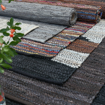  India imported cowhide strip carpet living room Nordic color matching woven coffee table mat Simple bedroom bedside carpet model room