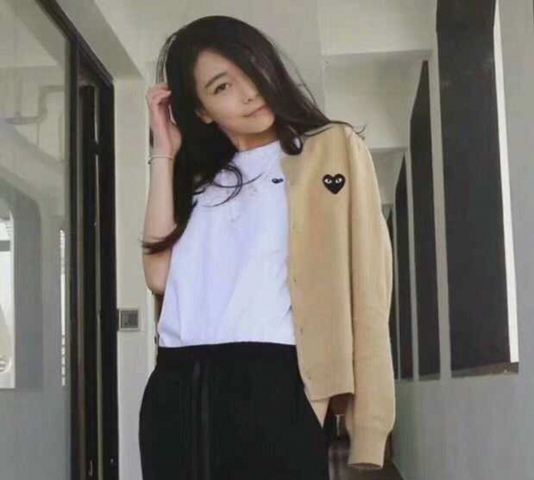 Ngôi sao với chiếc áo len len cùng áo len nữ tình yêu mùa xuân và mùa thu ngắn cổ tròn trái tim đào đôi áo len màu rắn áo len cổ lọ
