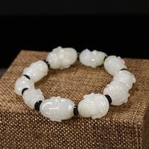 Runyuyuan exquisite Xinjiang Hetian Jade yellow skin seed material carved Buddha head string bracelet hand decoration strange Luohan 39g