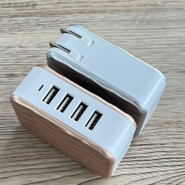 Remax 30W Multi-Port Desktop 4Usb Charging Head with Foldable Feet 5V 6A Supports 2.4A Protocol Suitable for Apple 8 X 11 12 13 14 iPad Mobile Phones and Tablets