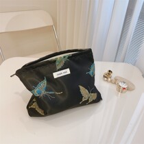 Japans new black bottom butterfly cosmetic bag for girls portable high-end handbag-style liner bag large-capacity storage bag