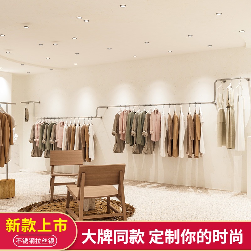 Clothing store on the wall display shelves display shelves for men and women children's clothing wall hanging clothes pole brushed silver stainless steel hangers