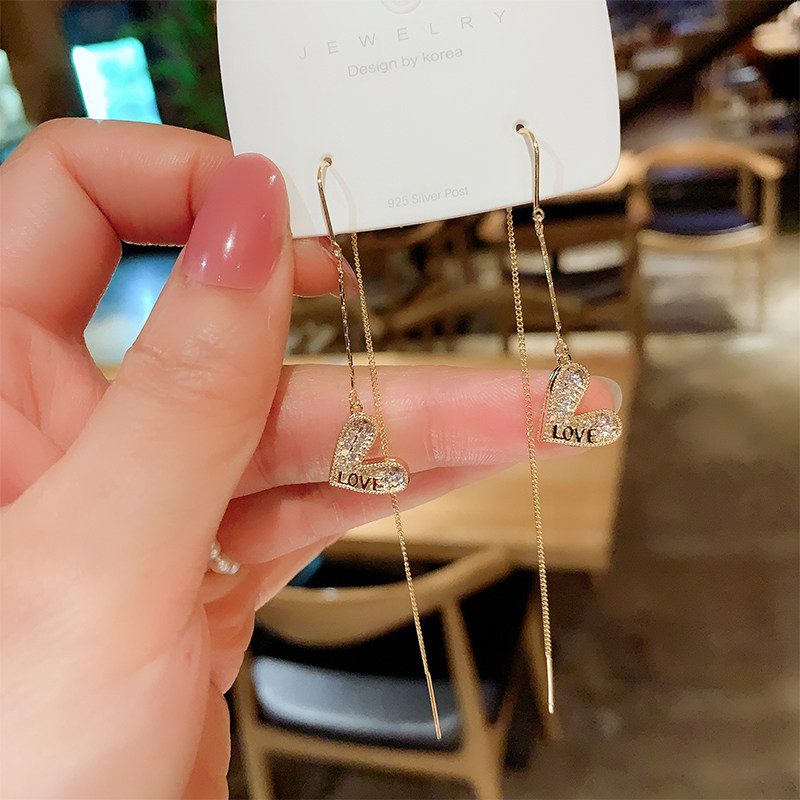 Earrings women's 2022 new trendy temperament high-end atmosphere net red with the same light luxury tassel temperament long earrings