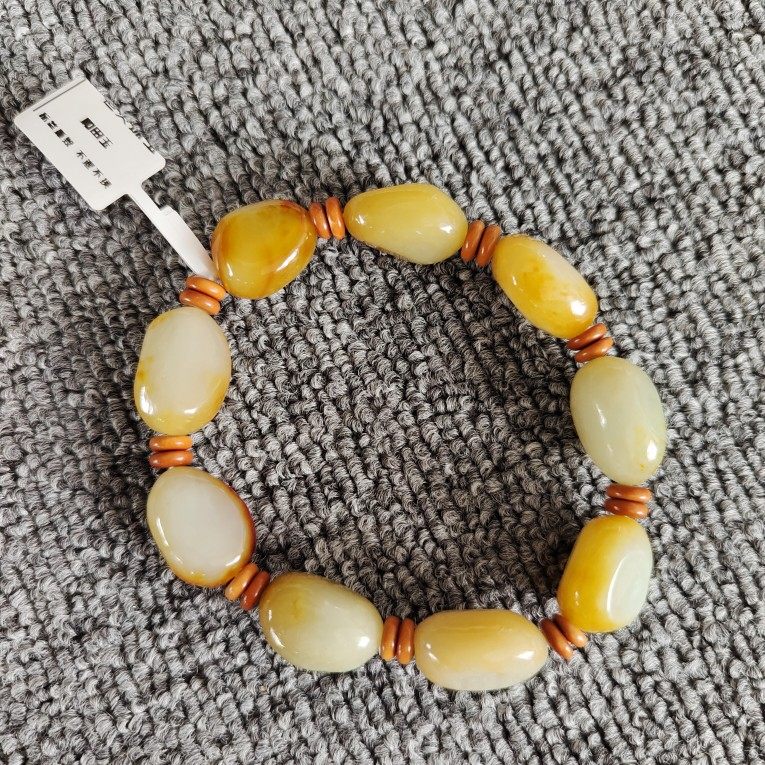 Xinjiang natural Hetian jade raw stone seed material raw skin raw seeds sprinkled with golden skin lake water green men's and women's hand string bracelet with certificate