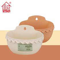 Integrity fleshy plastic resin wall-mounted flowerpot water storage and water delivery adhesive hook