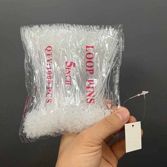 A pack of about 1,000 hair accessories with mother-in-law buckles, zip ties, pointed plastic ropes, fixed ropes and labels