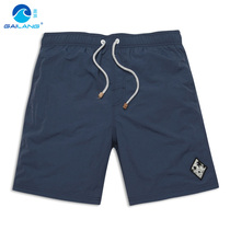 Beach pants mens quick-drying large size loose casual quick-drying shorts solid color lined flat corner hot spring seaside five-point swimming trunks