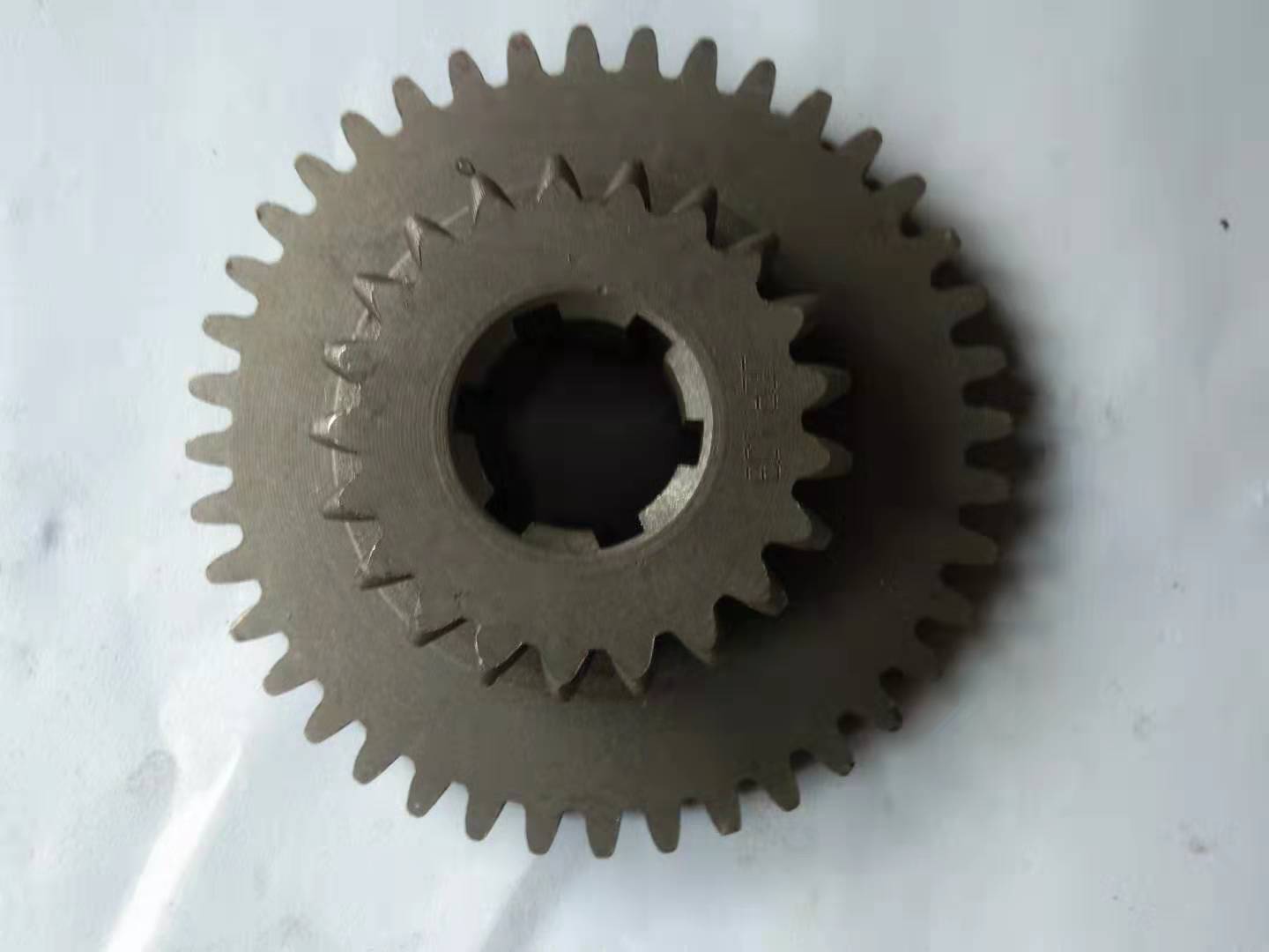 The Tiantong Changchun Taishan small four-wheeled tractor loader gearbox gear
