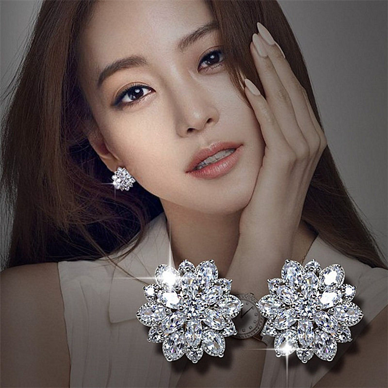 Hot sell hot sell silver zirconium sunflower ear needle female Japanese Korean with drilling eye snowflake earrings