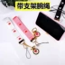 Điện thoại di động dây buộc phim hoạt hình nữ ngắn dây đeo cổ tay Hàn Quốc cá tính sáng tạo thương hiệu đường phố phụ kiện chống trượt đai chống trượt khung