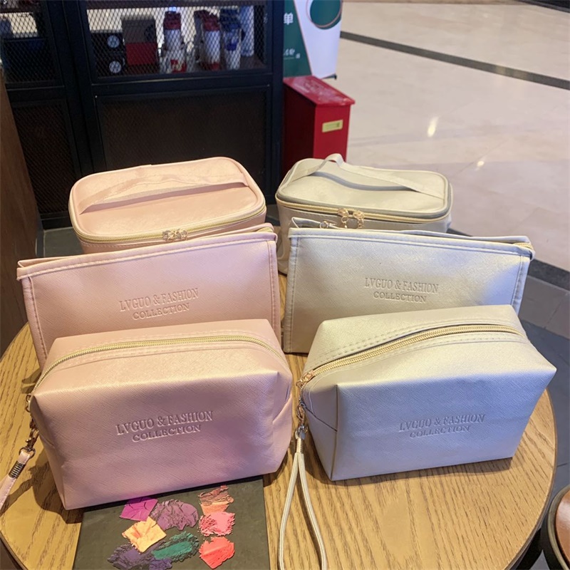 New Japanese and Korean boutique waterproof PU leather cosmetic bag multifunctional makeup large capacity storage bag simple girl's heart