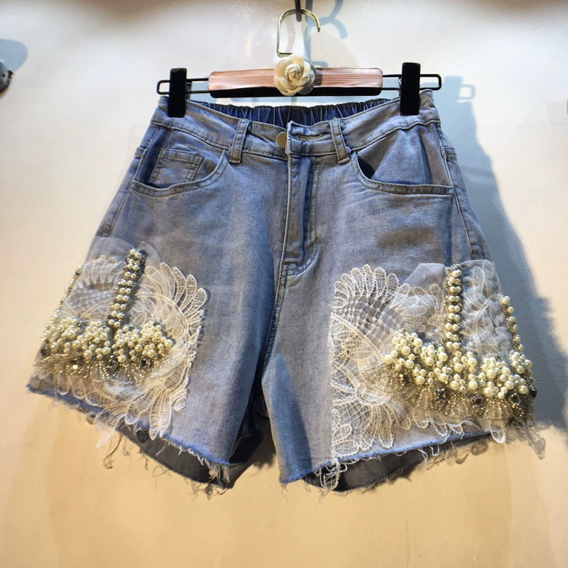 Châu Âu 2020 hè mới công nghiệp nặng đinh đính hạt móc hoa ren eo cao đã mỏng chân rộng quần short denim nữ - Quần jean