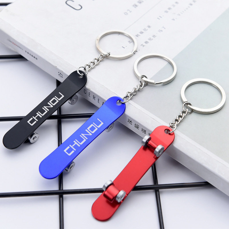 Europe and America popular scooter key button beer bottle opener does not lose color hanging parts multi-function small toy creative single