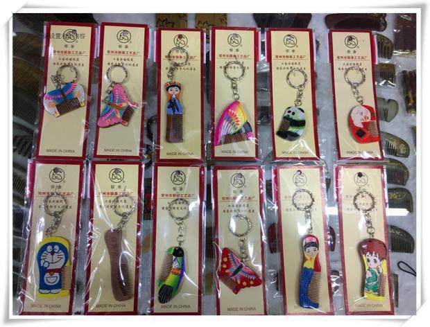 Changzhou special wooden comb hair and peach painting key buckle traditional craft comb small gift comb