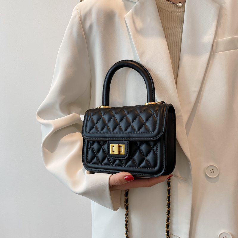 With a taste ~ show temperament 2022 fashionable niche diamond leather bag ladies solid color can be cross-body portable