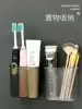 Creative powder room comb storage tube Wall-mounted bathroom bucket for comb Household toothpaste Toothbrush rack shelf