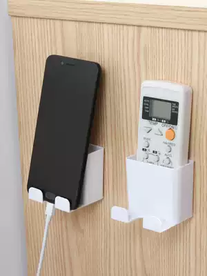 Household remote control storage box wall-mounted plug adhesive hook suction Wall mobile phone charging bracket bedroom remote control box