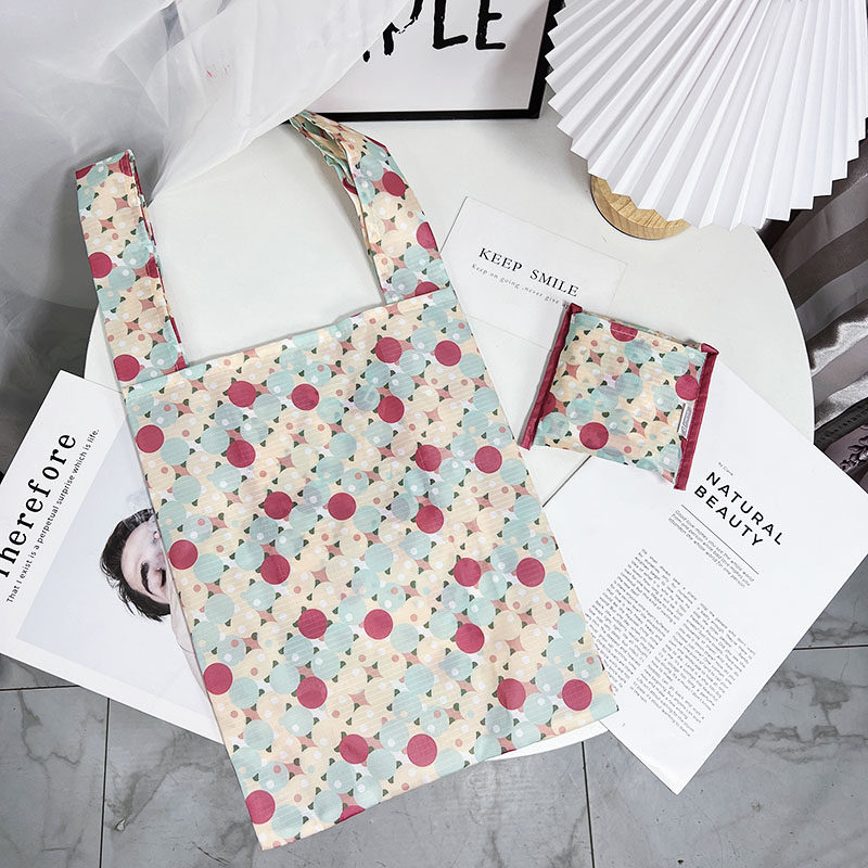 Outlet thickened nylon waterproof portable folding handbag small fresh printed shopping bag sturdy supermarket eco-friendly bag